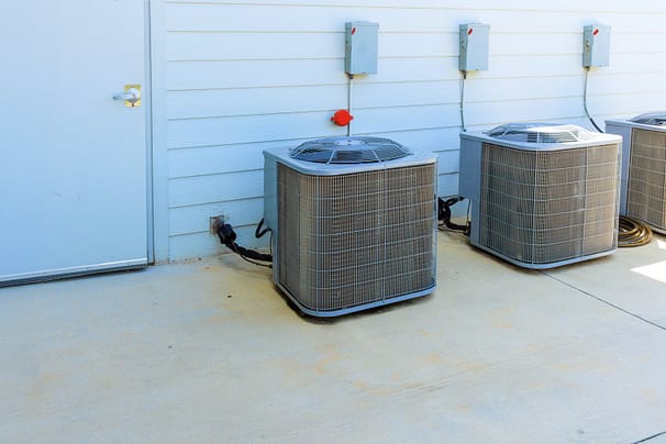 Air Conditioners Installed in Backyard